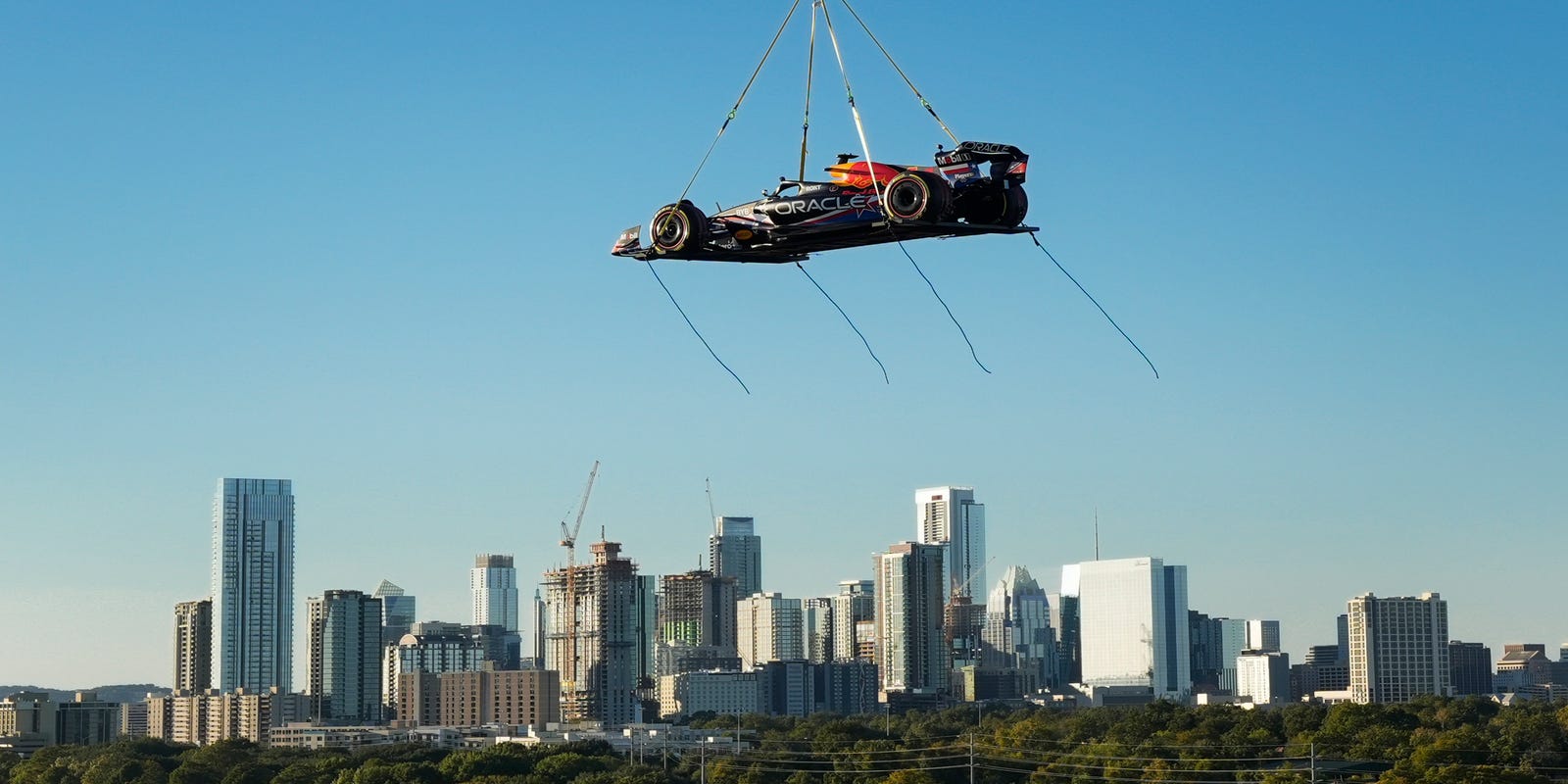 watch-as-red-bull-flies-new-f1-car-across-downtown-austin-via-helicopter